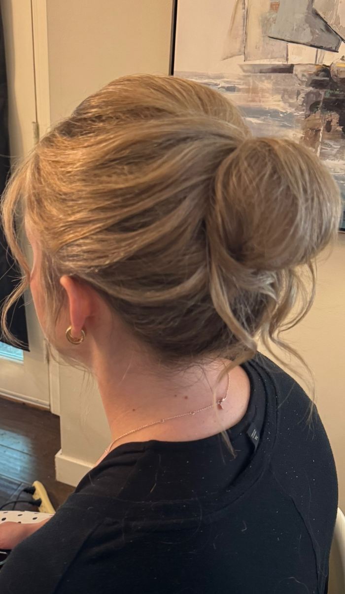 Textured messy bun updo by Yiqara Hair Co.