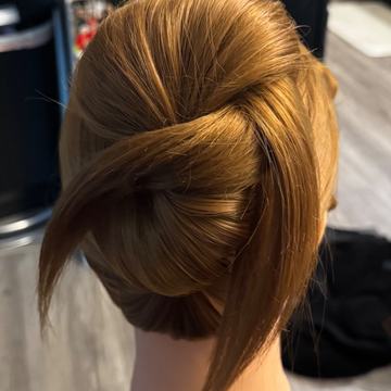 Twisted chignon updo, Yiqara Hair Co. Instagram